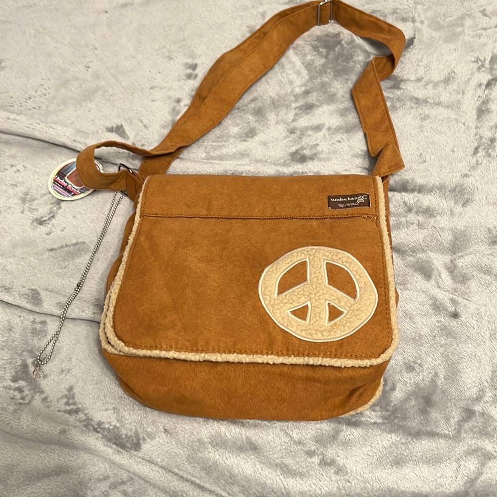 Cross body, Undee Bands, NWT with trendy peace sign & necklace attached